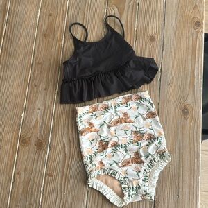 Kortni Jeane tiger bottom and black top swimsuit